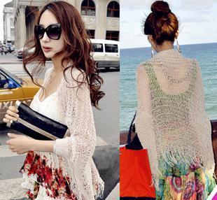 百搭時尚，夏日防曬新風(fēng)尚——新款流蘇鏤空沙灘裙外罩衫